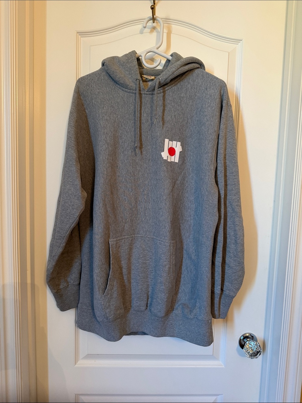 Men's Undefeated Gray Pullover Hoodie with Japan Graphic Chest Print